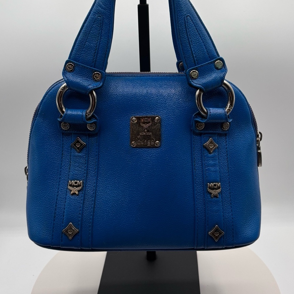 Pre-loved MCM Electric Blue handbag.